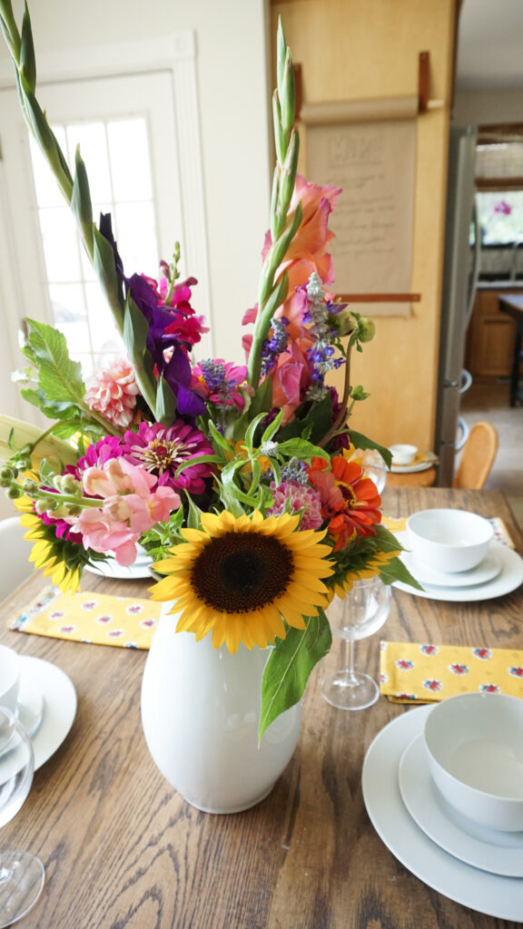 Beautiful Bouquet of Summer flowers on a handmade table